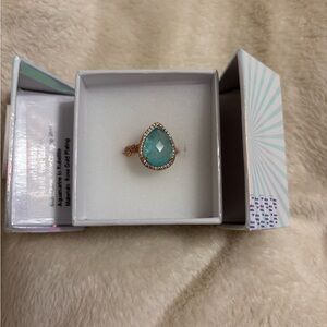 Elegant Teardrop Ring with Blue Stone and Rose Gold Accents